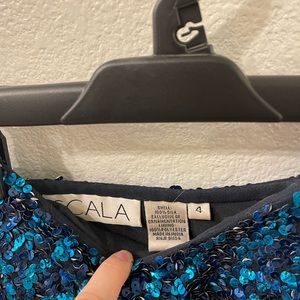 Scala sequin pattern dress. Cocktail attire. Short. Size 4. One sleeve.